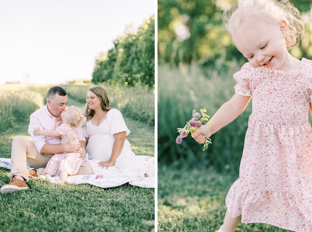 Sitting on a white quilt, a little girl stretches up to kiss her daddy during their family photos by Indianapolis family photographer Katelyn Ng.