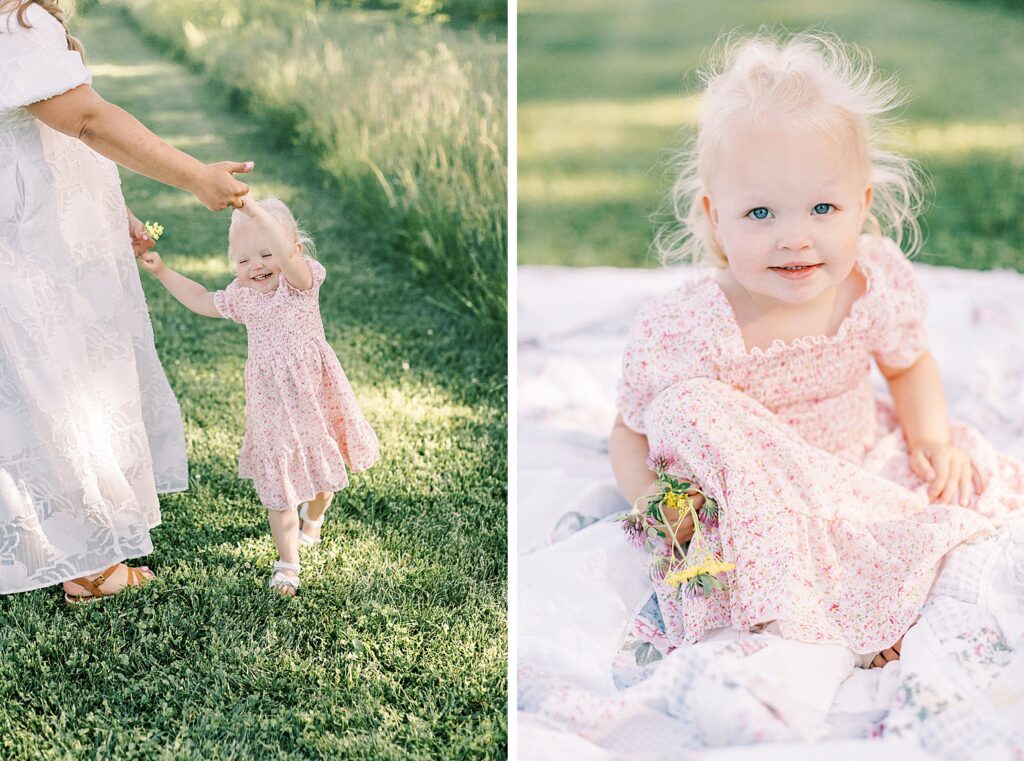 A little girl sits on a quilt holding wildflowers and then dances with her mother during their family portraits by one of Indianapolis family photographers.