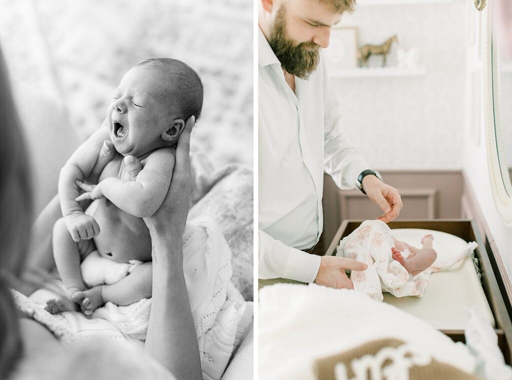 A black and white photo of a baby yawning.
